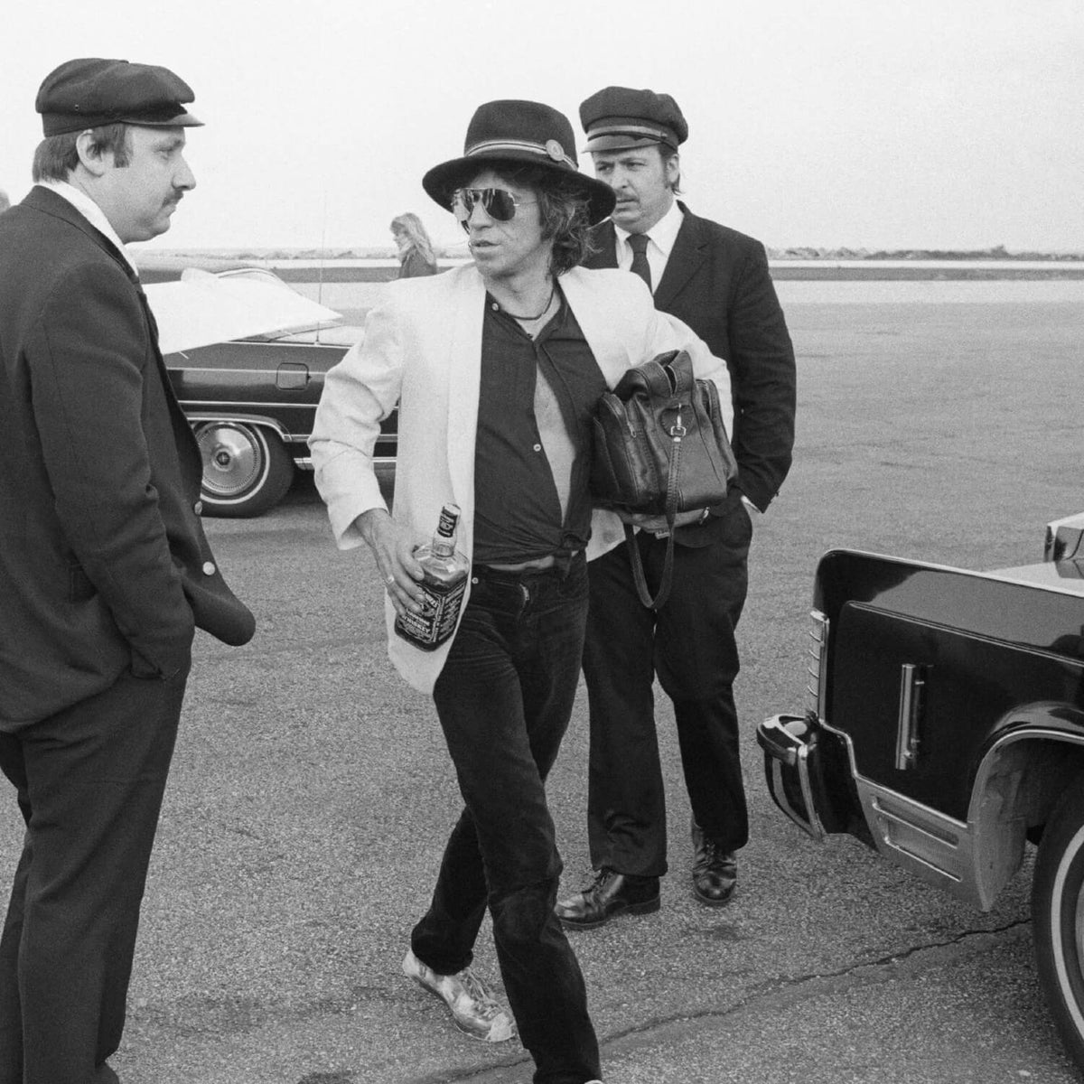 Keith Richards, Holding a Bottle of Jack Daniels, Midwest Airport